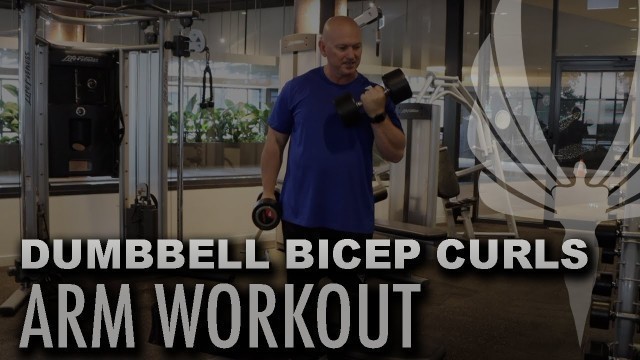 'Strength Training : Performing Standing Dumbbell Bicep Curls with Global Fitness Institute'