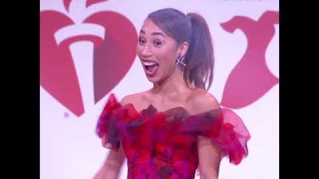 'Eva Gutowski | Red Dress Collection Runway'