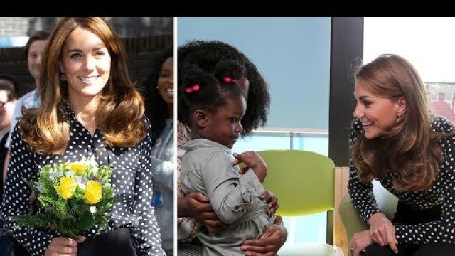 'Kate Middleton looks radiant in a £270 polka dot blouse as she visits a children\'s centre in London'